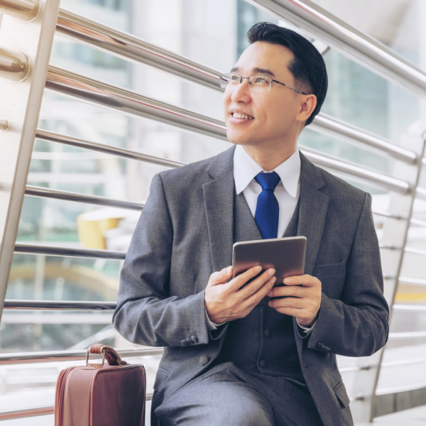 Business person holding tablet